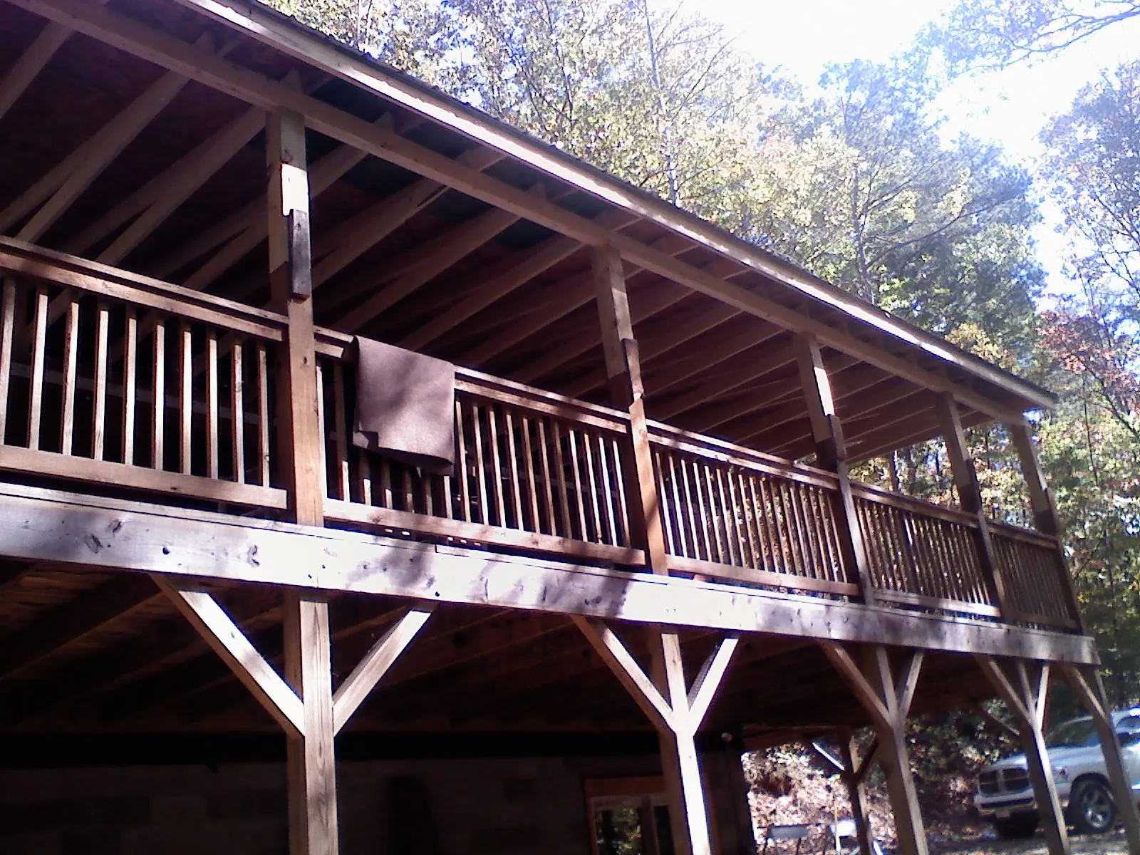 Timber framing under a new elevated porch and deck — Roof Leak Repair in Reform by Roofing Brothers